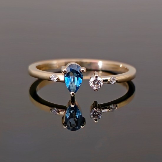 Prsten od žutog zlata sa London topaz I brilijantia. 0501-180