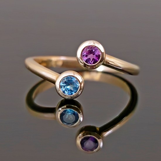 Prsten od žutog zlata sa blue topaz I ametistom 437-180